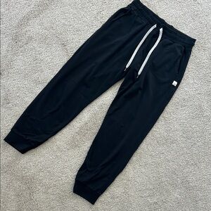 Vuori Black Joggers with White Tag